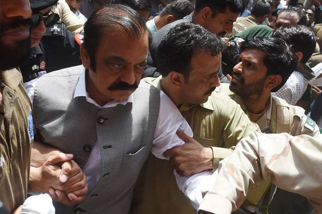 security officials of the anti narcotics force anf escort arrested senior leader of pakistan muslim league nawaz pml n rana sanaullah to court in lahore on july 2 2019 photo afp security officials of the anti narcotics force anf escort arrested senior leader of pakistan muslim league nawaz pml n rana sanaullah to court in lahore on july 2 2019 photo afp