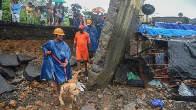 the death toll from a wall collapse in a mumbai slum rose to 26 as the city braced for more rain photo afp the death toll from a wall collapse in a mumbai slum rose to 26 as the city braced for more rain photo afp