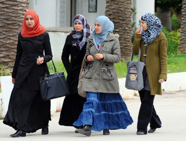in this file photo taken on january 17 2013 tunisian students walk at the manouba faculty of arts letters and humanities outside tunis photo afp in this file photo taken on january 17 2013 tunisian students walk at the manouba faculty of arts letters and humanities outside tunis photo afp