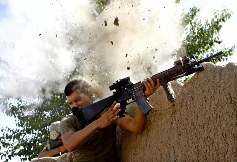 sgt william olas bee a us marine from the 24th marine expeditionary unit has a close call after taliban fighters opened fire near garmsir in helmand province of afghanistan may 18 2008 photo reuters sgt william olas bee a us marine from the 24th marine expeditionary unit has a close call after taliban fighters opened fire near garmsir in helmand province of afghanistan may 18 2008 photo reuters