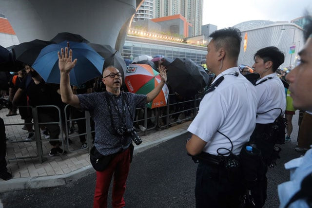 protesters gather near the west kowloon railway station during a demonstration against a proposed extradition bill in hong kong on july 7 2019 photo afp protesters gather near the west kowloon railway station during a demonstration against a proposed extradition bill in hong kong on july 7 2019 photo afp