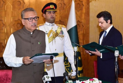hammad azhar takes oath as federal minister hammad azhar takes oath as federal minister