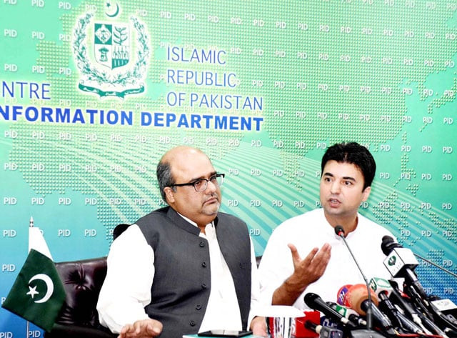 special assistant to the prime minister on accountability shahzad akbar with minister for communications and postal services murad saeed in a press conference in islamabad on monday photo pid special assistant to the prime minister on accountability shahzad akbar with minister for communications and postal services murad saeed in a press conference in islamabad on monday photo pid