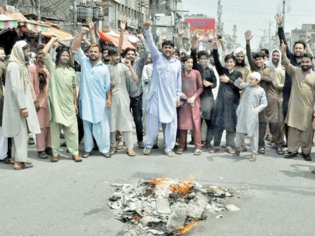 traders hold anti budget protest in raja bazaar on monday photo online traders hold anti budget protest in raja bazaar on monday photo online