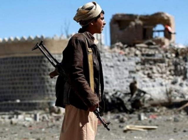 an armed yemeni inspects the damage following a reported saudi led coalition air strike on south sanaa photo afp an armed yemeni inspects the damage following a reported saudi led coalition air strike on south sanaa photo afp