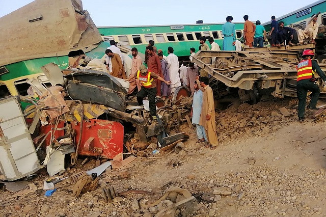 pakistani onlookers and local residents search for victims in the wreckage of train carriages after two trains collided in rahim yar khan pakistani onlookers and local residents search for victims in the wreckage of train carriages after two trains collided in rahim yar khan photo afp pakistani onlookers and local residents search for victims in the wreckage of train carriages after two trains collided in rahim yar khan pakistani onlookers and local residents search for victims in the wreckage of train carriages after two trains collided in rahim yar khan photo afp