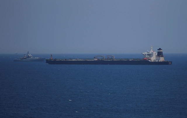 a british royal navy patrol vessel guards the oil supertanker photo reuters a british royal navy patrol vessel guards the oil supertanker photo reuters