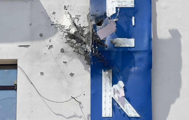 quot 112 ukraine quot tv channel damaged facade after the building was attacked an unknown person with a grenade launcher in kiev photo afp