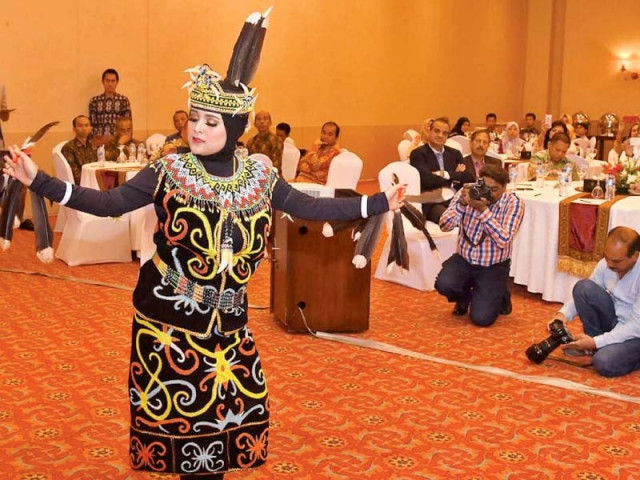 an indonesian performer presents traditional dance dna an indonesian performer presents traditional dance dna