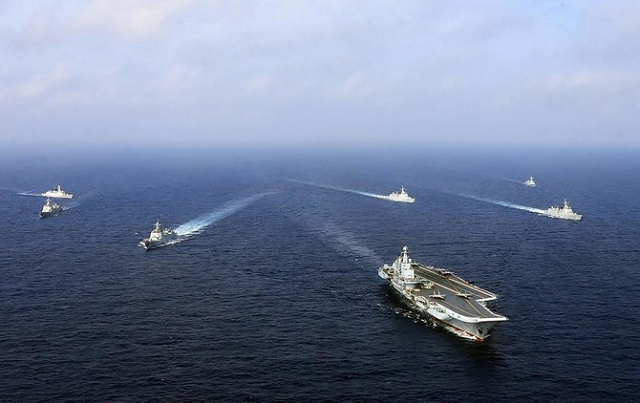 above the liaoning china s sole operational aircraft carrier sails with other ships during a drill at sea in this april 2018 photo afp above the liaoning china s sole operational aircraft carrier sails with other ships during a drill at sea in this april 2018 photo afp