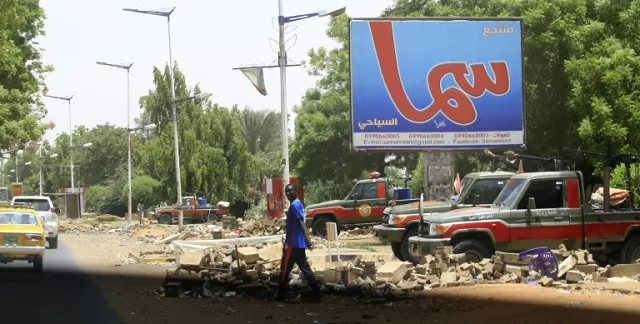 fewer people than usual were on the streets of khartoum patrolled by heavily armed paramilitaries photo afp