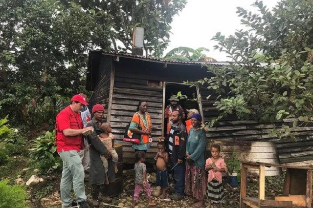 papuans outside a damaged house at kar in papua new guinea photo afp file papuans outside a damaged house at kar in papua new guinea photo afp file