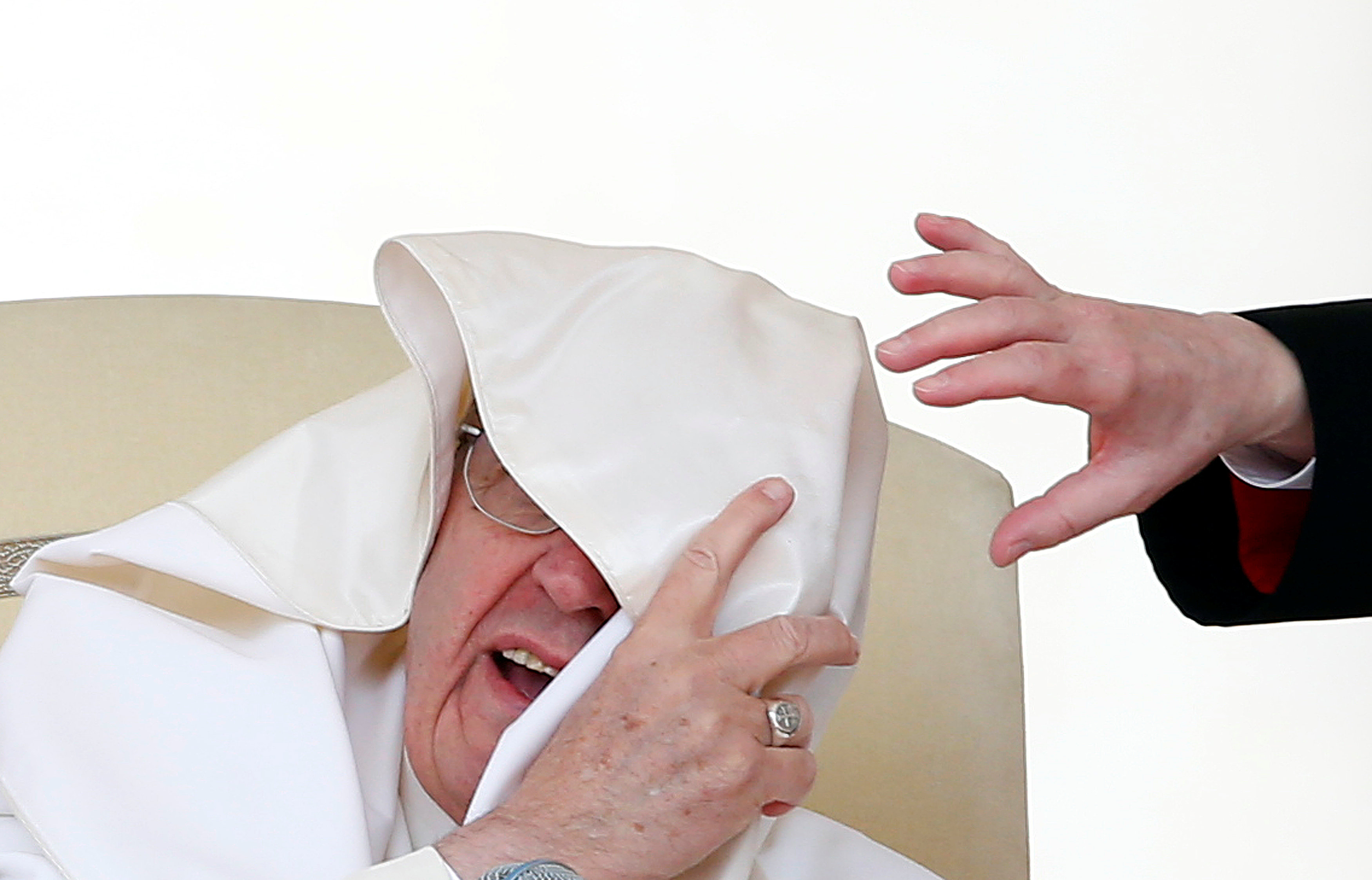A gust of wind blows Pope Francis' mantle during his Wednesday general audience in Saint Peter's square at the Vatican, April 26, 2017. REUTERS/Tony Gentile - RTS13YYG TPX IMAGES OF THE DAY