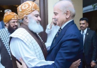 jui f chief maulana fazlur rehman warmly welcomes prime minister shehbaz sharif upon his arrival at the former s residence in islamabad photo app