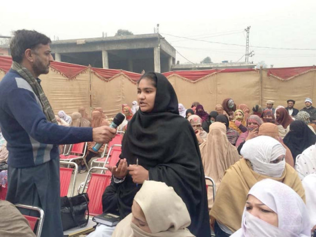 a woman speaks during the public hearing khuli katchery held in charsadda photo express a woman speaks during the public hearing khuli katchery held in charsadda photo express