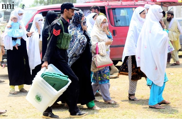 election staff transports ballot boxes to polling stations photo nni