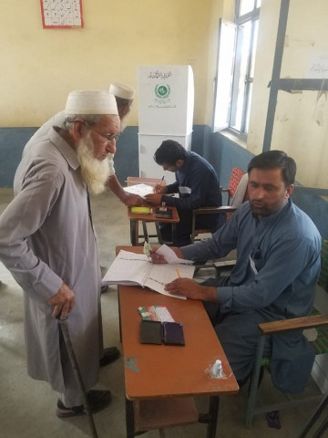 polling underway k p merged tribal districts photo express polling underway k p merged tribal districts photo express