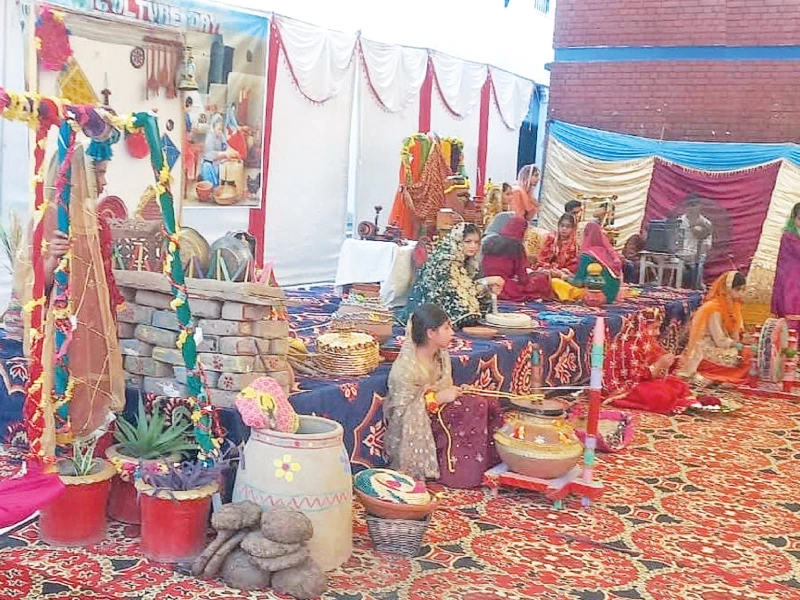 students of a girls school in narowal showcase traditional household chores at stalls set up during an event organised to mark the punjab culture day the day was celebrated to highlight the heritage of the province photo nni students of a girls school in narowal showcase traditional household chores at stalls set up during an event organised to mark the punjab culture day the day was celebrated to highlight the heritage of the province photo nni