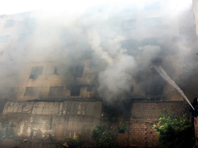 fire engulfs electronics market in saddar gutting shops and godowns firefighters battle for hours to douse the flames and rescue trapped residents photo jalal qureshi express fire engulfs electronics market in saddar gutting shops and godowns firefighters battle for hours to douse the flames and rescue trapped residents photo jalal qureshi express