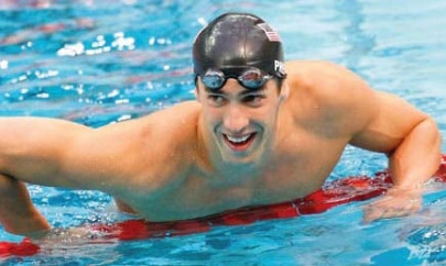 swimming phelps cruises to victory