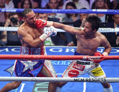 40 year old pacquiao downs thurman to capture wba crown 40 year old pacquiao downs thurman to capture wba crown