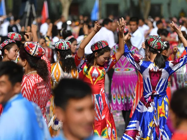 nearly 10 000 residents dance in local dolan maxrap folk style in awat county in the xinjiang uygur autonomous region on oct 9 2018 photo china news service nearly 10 000 residents dance in local dolan maxrap folk style in awat county in the xinjiang uygur autonomous region on oct 9 2018 photo china news service