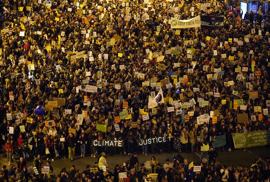 People attend a climate change protest march, as COP25 climate summit is held in Madrid, Spain, December 6, 2019. REUTERS/Juan Medina