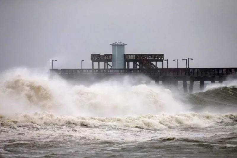 waves crash along a pier as hurricane sally approaches in gulf shores alabama u s september 15 2020 reuters waves crash along a pier as hurricane sally approaches in gulf shores alabama u s september 15 2020 reuters