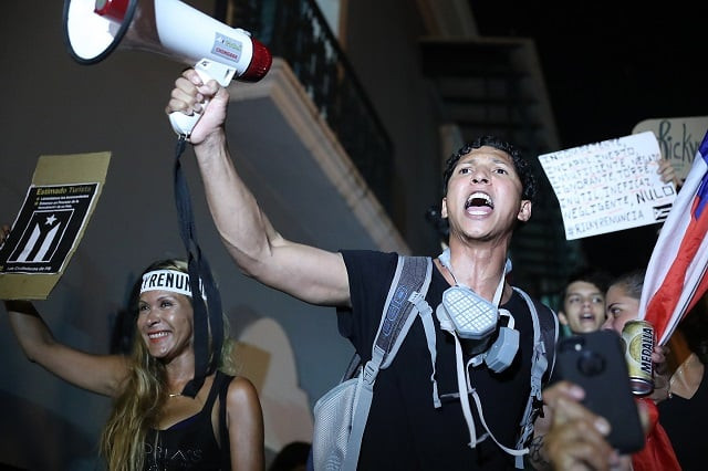 people react after hearing while demonstrating near the governor 039 s mansion reports that gov ricardo rossello will step down photo afp people react after hearing while demonstrating near the governor 039 s mansion reports that gov ricardo rossello will step down photo afp
