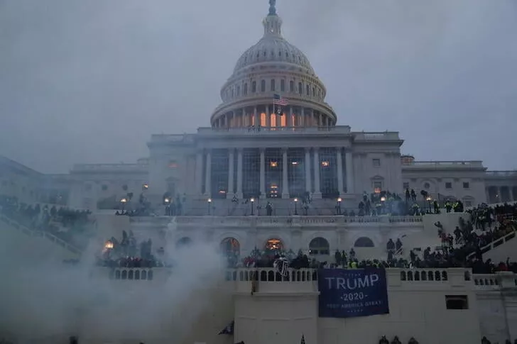 an explosion caused by a police munition is seen while supporters of u s president donald trump gather in front of the u s capitol building in washington u s january 6 2021 reuters an explosion caused by a police munition is seen while supporters of u s president donald trump gather in front of the u s capitol building in washington u s january 6 2021 reuters