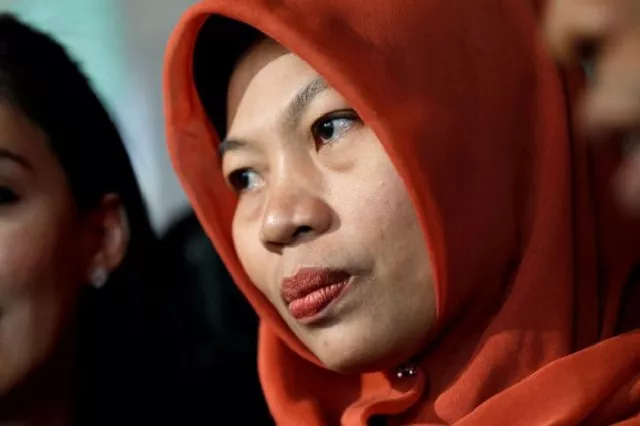 baiq nuril maknun reacts to journalists as she arrives at the law and human rights ministry office in jakarta indonesia photo reuters baiq nuril maknun reacts to journalists as she arrives at the law and human rights ministry office in jakarta indonesia photo reuters