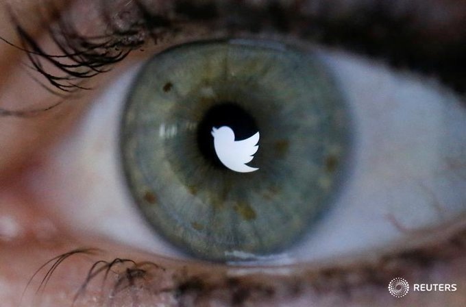 an illustration picture shows the twitter logo reflected in the eye of a woman in berlin november 7 2013 photo reuters