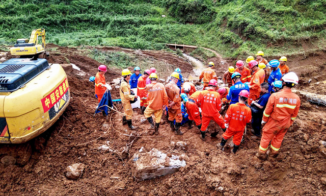 rescuers are working at the site of a landslide in liupanshui in china 039 s southwestern guizhou province photo afp rescuers are working at the site of a landslide in liupanshui in china 039 s southwestern guizhou province photo afp