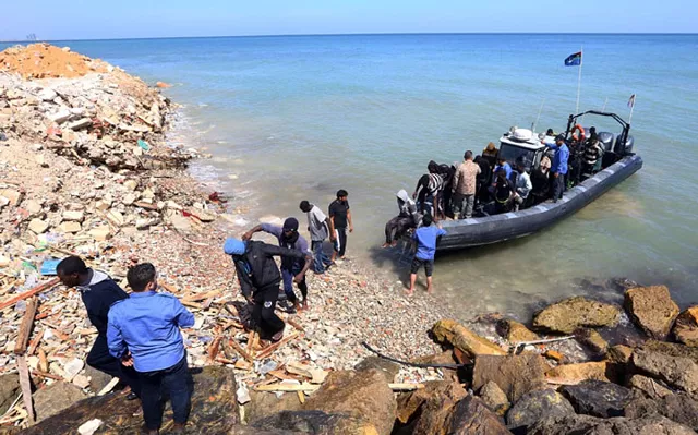 migrants from africa arrive on shore after being rescued by libyan coast guards rescued at sea off the coastal town of tajoura 15 kilometres east of the capital tripoli on 23 may 2017 photo afp migrants from africa arrive on shore after being rescued by libyan coast guards rescued at sea off the coastal town of tajoura 15 kilometres east of the capital tripoli on 23 may 2017 photo afp