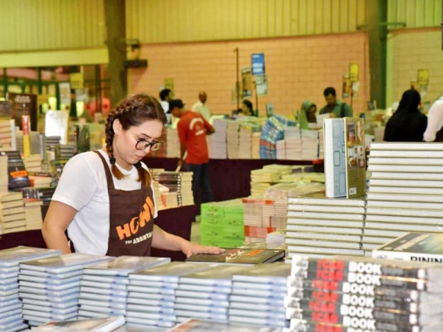 a visitor to the big bad wolf book sale at the expo centre looks at the merchandise on offer the event is said to be the biggest book sale in the world and has come to karachi for the first time photo press release a visitor to the big bad wolf book sale at the expo centre looks at the merchandise on offer the event is said to be the biggest book sale in the world and has come to karachi for the first time photo press release
