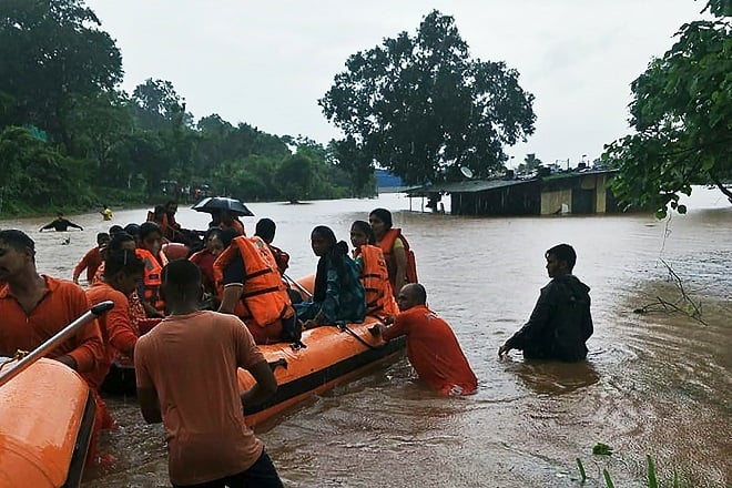 ndrf personnel rescue train passengers stranded in a flooded area photo afp