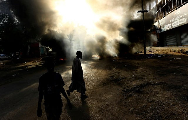 protesters burn tyres during a demonstration against a report of the attorney general on the dissolution of the sit in protest in khartoum sudan photo reuters protesters burn tyres during a demonstration against a report of the attorney general on the dissolution of the sit in protest in khartoum sudan photo reuters