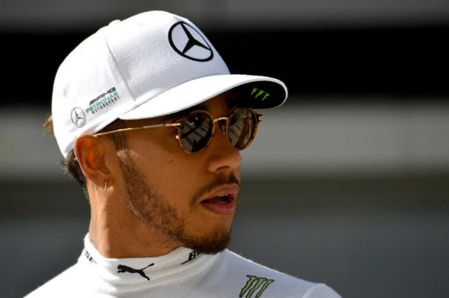 the five time world champion said had a sore throat when he woke up on saturday and told the team he was not feeling well photo afp the five time world champion said had a sore throat when he woke up on saturday and told the team he was not feeling well photo afp