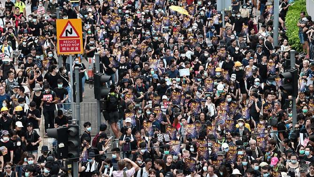 protesters march during a demonstration in hong kong photo afp