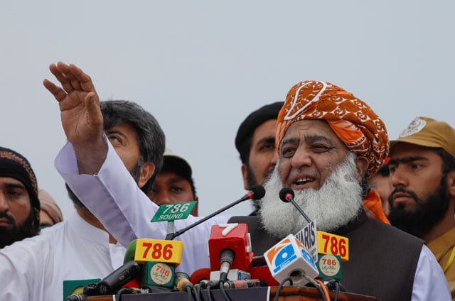 jui f chief fazlur rehman speaks to the supporters during a countrywide protest against the government in peshawar on thursday photo reuters