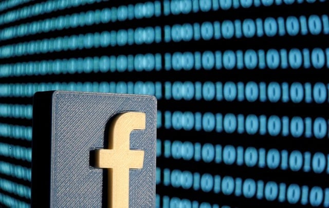 a 3 d printed facebook logo is seen in front of displayed binary code in this illustration picture june 18 2019 photo reuters a 3 d printed facebook logo is seen in front of displayed binary code in this illustration picture june 18 2019 photo reuters
