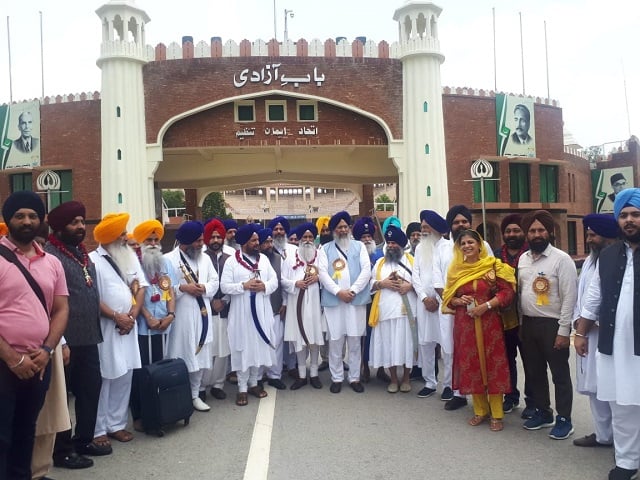 around 500 pilgrims entered pakistan through the wagah border crossing on tuesday photo express