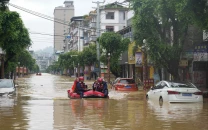 cyclone threat looms as southern china battles widespread flooding