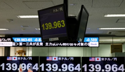 monitors displaying the current japanese yen exchange rate against the u s dollar are pictured at a dealing room of the foreign exchange trading company gaitame com in tokyo japan photo reuters