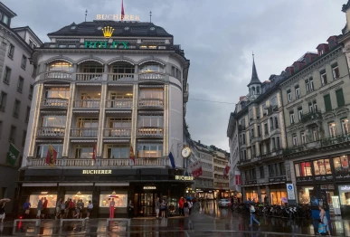 a logo of watchmaker rolex adorns a building on grendel street during a rainy day at schwanenplatz in lucerne switzerland via reuters