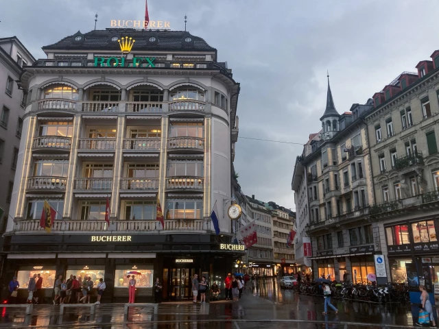 a logo of watchmaker rolex adorns a building on grendel street during a rainy day at schwanenplatz in lucerne switzerland via reuters