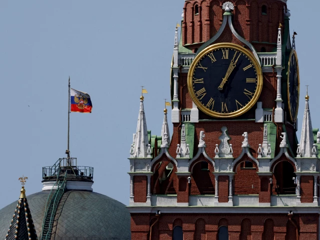 the russian flag flies on the dome of the kremlin senate building behind spasskaya tower in moscow russia photo reuters the russian flag flies on the dome of the kremlin senate building behind spasskaya tower in moscow russia photo reuters