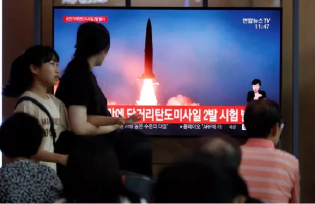 people watch a tv that shows a file picture of a north korean missile for a news report on north korea firing short range ballistic missiles in seoul south korea july 31 2019 photo reuters people watch a tv that shows a file picture of a north korean missile for a news report on north korea firing short range ballistic missiles in seoul south korea july 31 2019 photo reuters