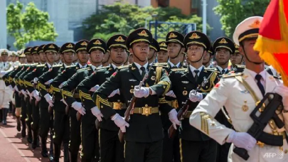 china warns hk protesters with slick military video