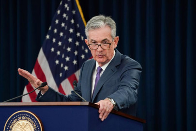 fed cuts interest rates signals it may not need to do more